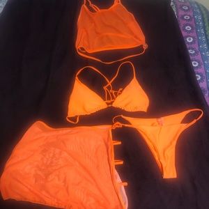 Brand new 4 piece Bathing suit. Size: XL